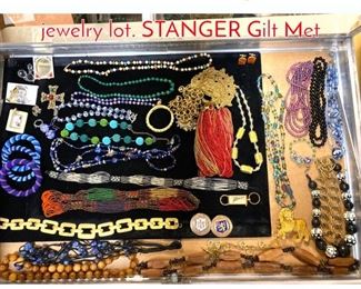 Lot 288 Case Lot Y. Large costume jewelry lot. STANGER Gilt Met