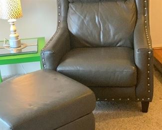 GREY LEATHER CHAIR AND OTTOMAN