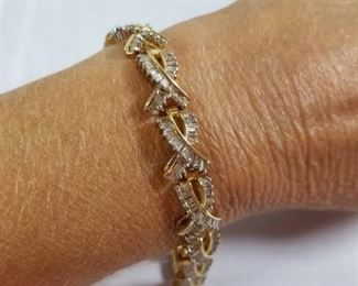 14 Karat Yellow Gold & Diamond Bracelet. https://ctbids.com/#!/description/share/276435