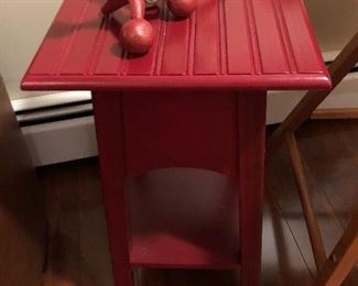 Cute red table and cast iron jacks