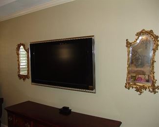 Flat screen tv and pair Rococco mirrors