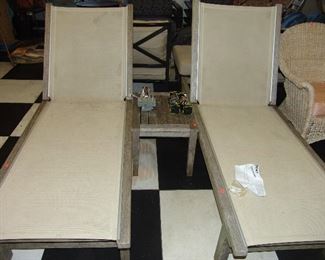 Pair teak wood lounge chairs and matching table