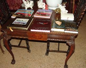 Game table with Corvette books