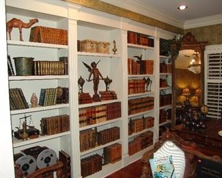 Large assortment of antique leather bound books