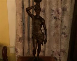 Unique heavy wood man statue.