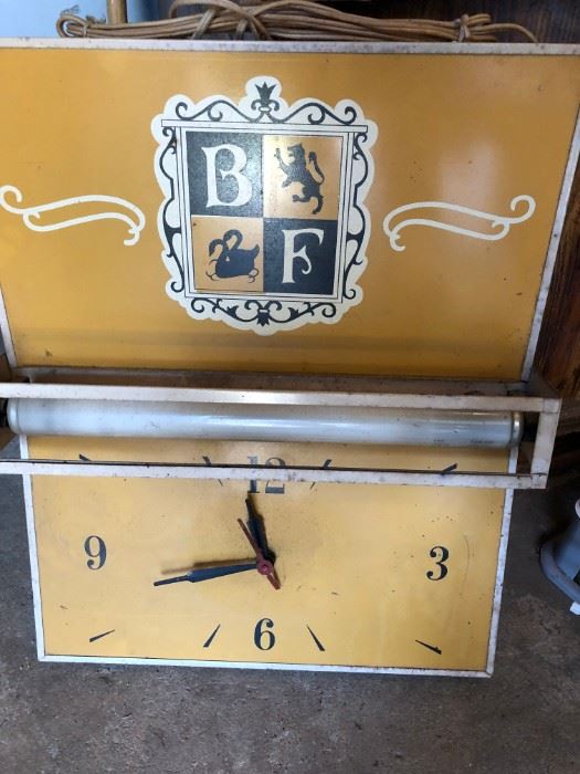 metal advertisement clock