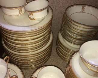 CLOSE UP VIEW OF LARGE FULL  HAVILAND FRANCE LIMOGES ANTIQUE PORCELAIN DINNERWARE SET GOLD BAND - FAMILY PURCHASED ITEM FROM J. L. HUDSONS 