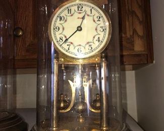 CLOSE UP VIEW OF RARE COLLECTION OF RARE ANTIQUE SIGNED GERMAN GLASS DOME BRASS CLOCKS