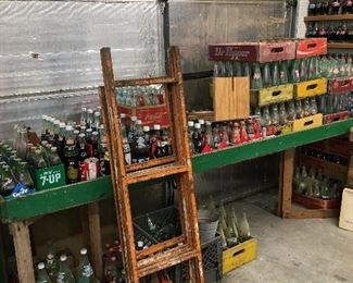 Tons of Coca Cola bottles and related collectibles