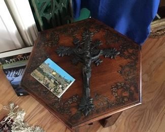 Antique iron crucifix 
Nicely carved table
