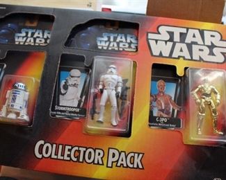 Star wars action figures in boxes