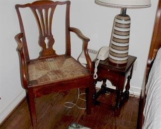 side table, arm chair rush woven seat, close up of 50's lamp, moose hooked rug