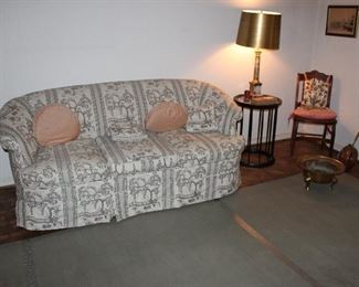 Vintage oriental print sofa, round side table