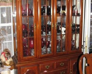 nice cabinet full of red glass