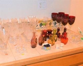 NICE GLASSES TO CHOOSE FROM AND COLORED GLASS BOTTLES AND VASES