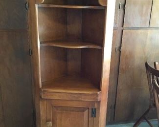 Corner maple unit with shelves and lower storage