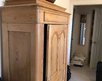 Lovely armoire with shelves and drawer below.