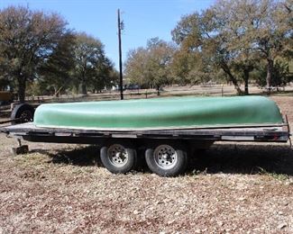 18' x 8' tandem-axle equipment trailer with pull-out ramps