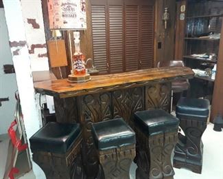 Carved Wooden Bar with Stools and Jack Daniels Themed Lamp