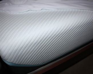 This is a Tempur-Pedic Sleep Number Mattress.  Adjust Back, Feet and Legs,  and Firmness
