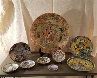 collection of assorted plates and bowls