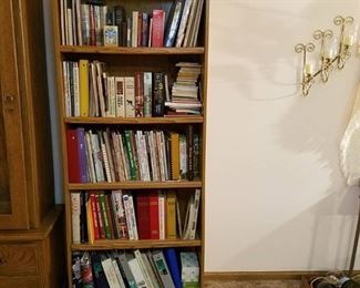 bookshelf and contents - about 3 shelves of cookbooks