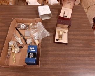 Assorted watches, zippo lighter and belt buckle