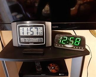 Sharp atomic clock with sensor and alarm clock