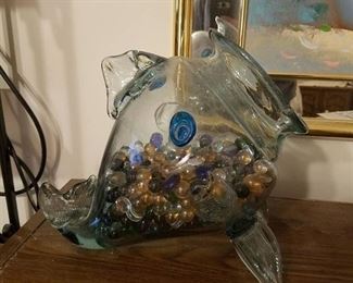 glass fish bowl with assorted marbles