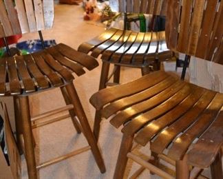 Set of three wood bar stools.