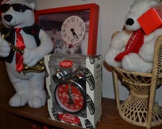 Coca Cola alarm clock (it works), wall clock and various bears.