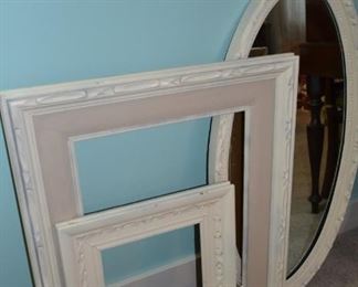 Shabby chic looking mirror and frames.