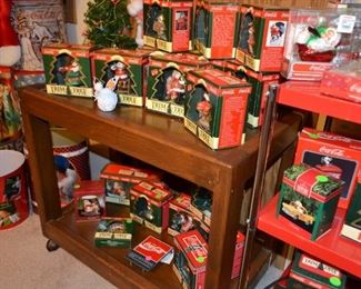 Lots of Coca Cola Christmas ornaments - many in their original boxes!
