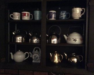 And collection of tea kettles 