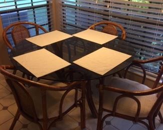 Glass top rattan kitchen set with set of four matching chairs