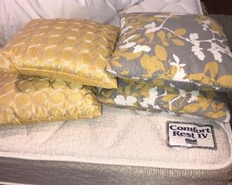 Throw pillows on king size mattress set