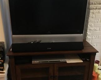 2006 37 in Visio Flatscreen, Soundbar, Entertainment console, Sony DVD player.