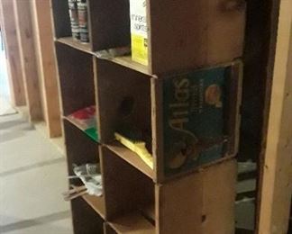 Fruit boxes all attached to make an adorable shelving unit. 