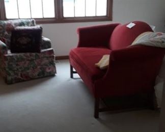 Red victorian style settee.