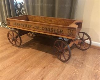 Antique style wooden wagon with metal wheels