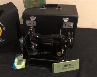 Singer featherweight sewing machine with original hard case and custom embroidered dust cover