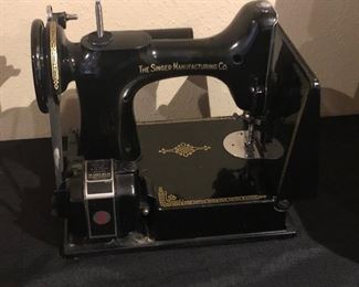 Singer featherweight sewing machine with original hard case and custom embroidered dust cover