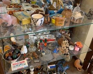 Large collection of collectible miniatures including handcrafted southwestern pottery
