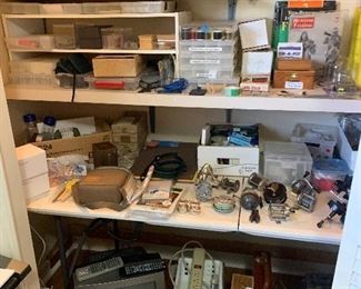 Huge collection of fishing reels, flyfishing ties, and more