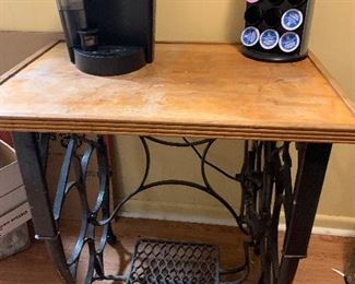 Keurig coffee maker, and cast iron antique sewing machine base made into table