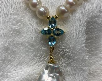 Genuine freshwater pearl necklace with topaz gemstones in sterling silver setting
