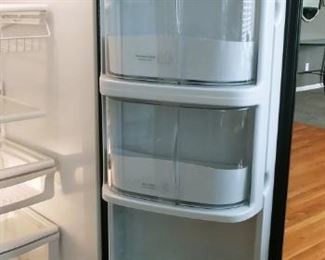 Amana Black side by side refrigerator with filtered water and ice dispenser. Model#ARSE665BB - Check out this interior space!!!Love Love $300
