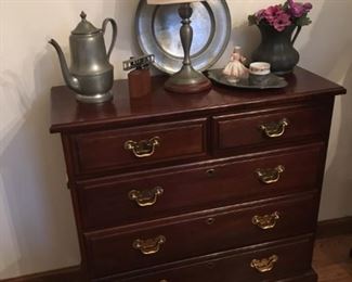a second smaller chest of drawers