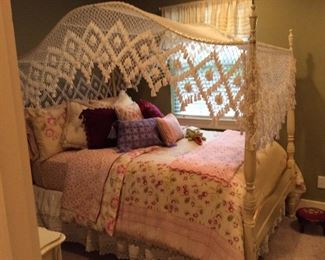 Cute white bed with canopy