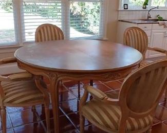 $650 White washed hardwood table with hidden leaf
$150 each 4 white washed hardwood chairs